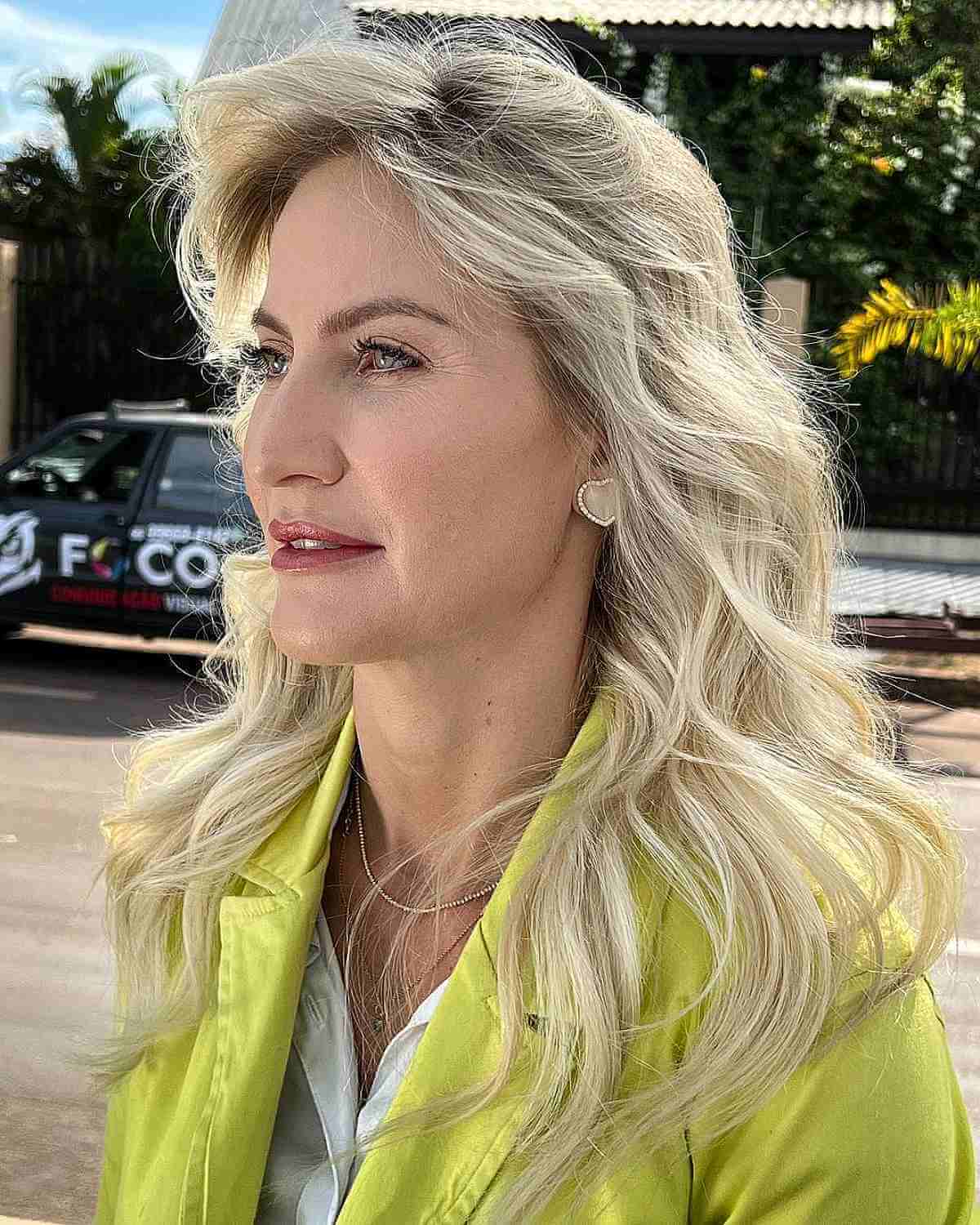 Medium to Long Hair Styled with Gentle Waves for Mature Women