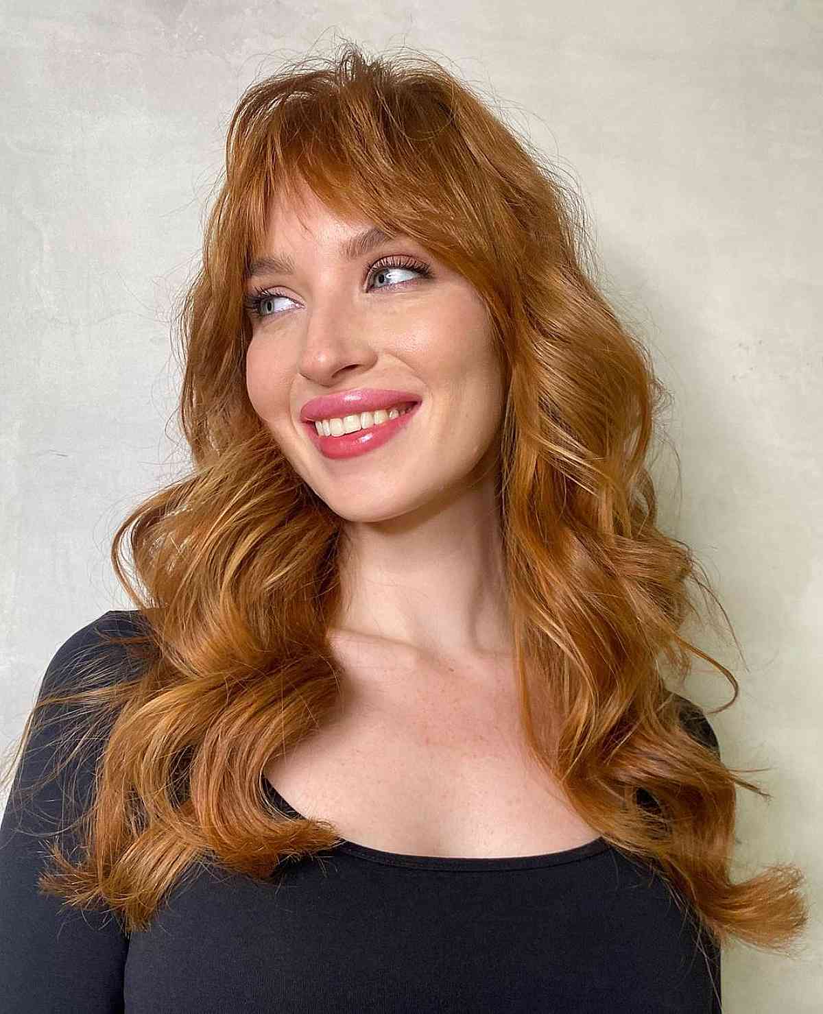 Medium-to-Long Textured Cut with Bangs