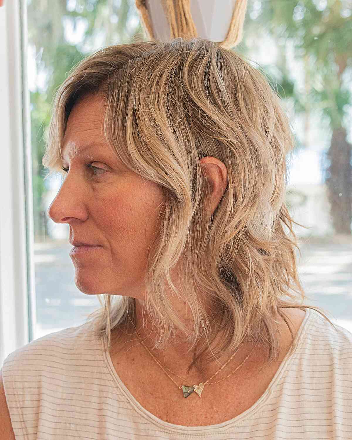 Wash and Wear Medium Wavy Hair with Textured Layers for 50-Year-Old Ladies with Long Face Shapes