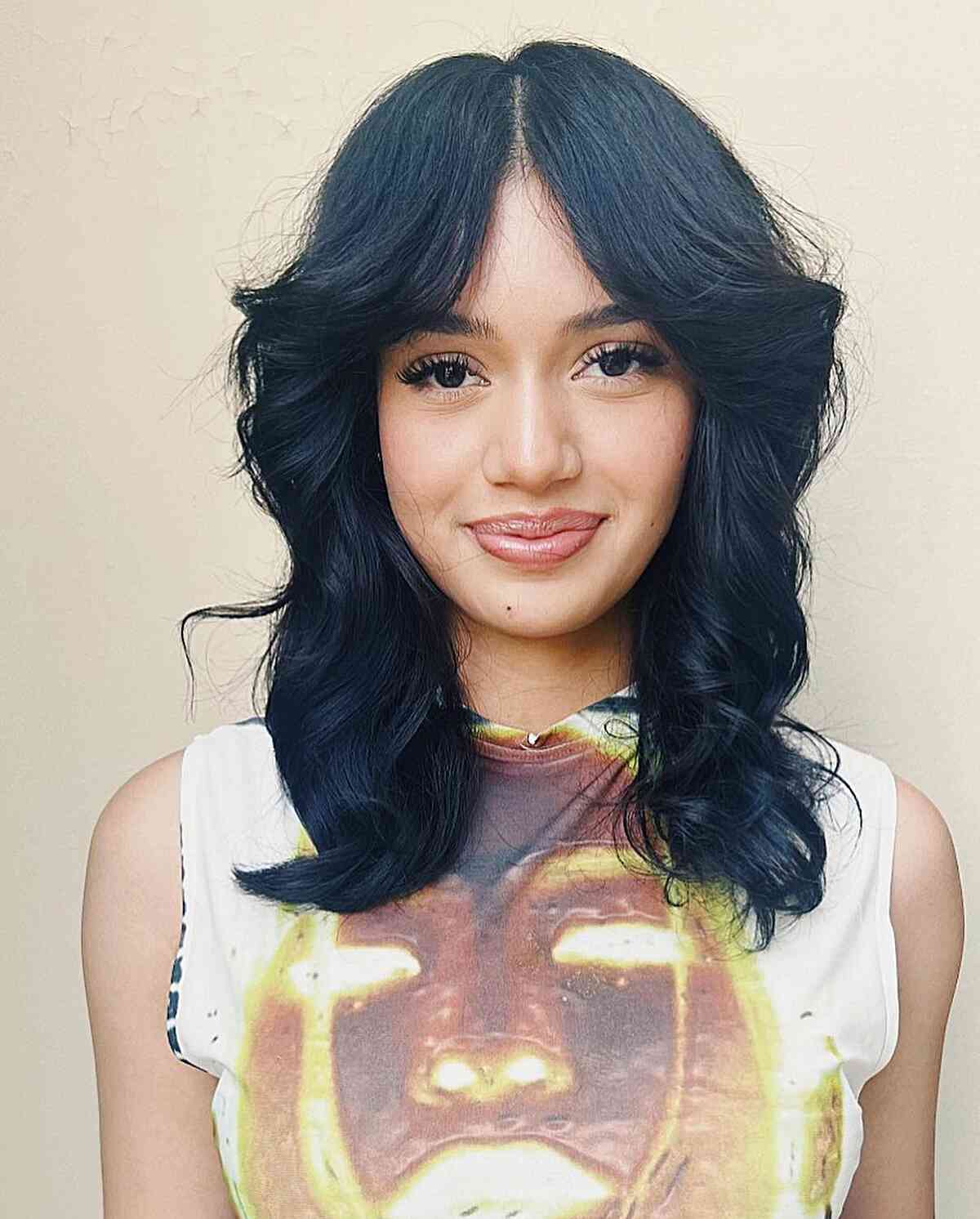 Medium Wolf Cut Featuring Curtain Bangs for girls with very dark hair