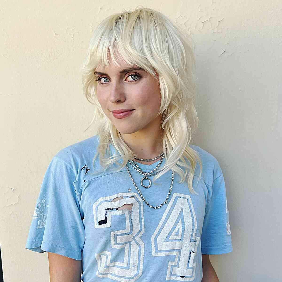 Medium Wolf Cut with 80s Vibes