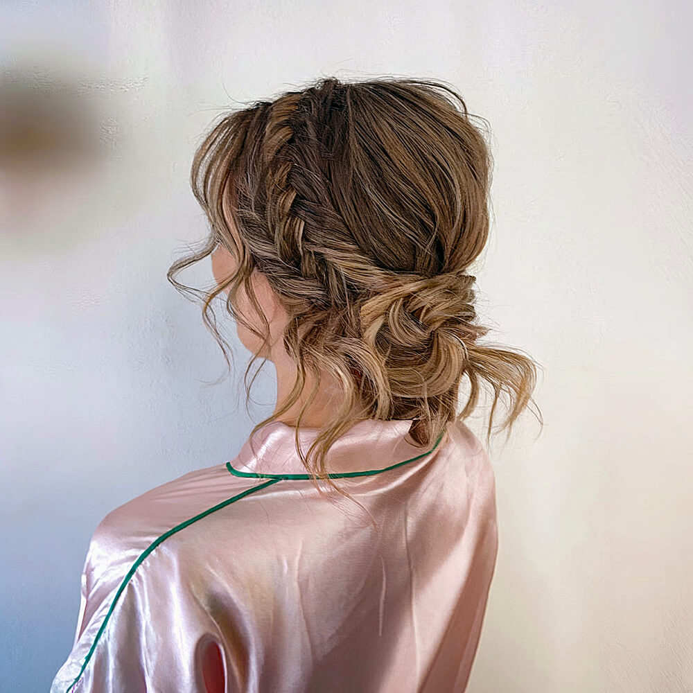 Messy Bun with a Side Fishtail Braid