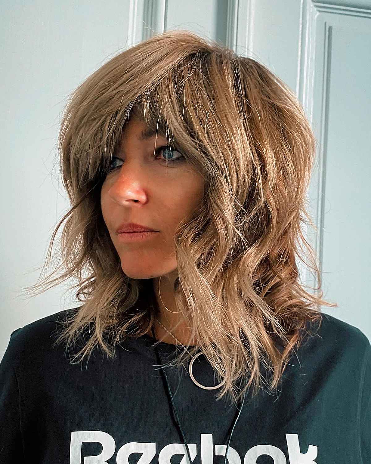 Messy Waves with Side-Swept Bangs