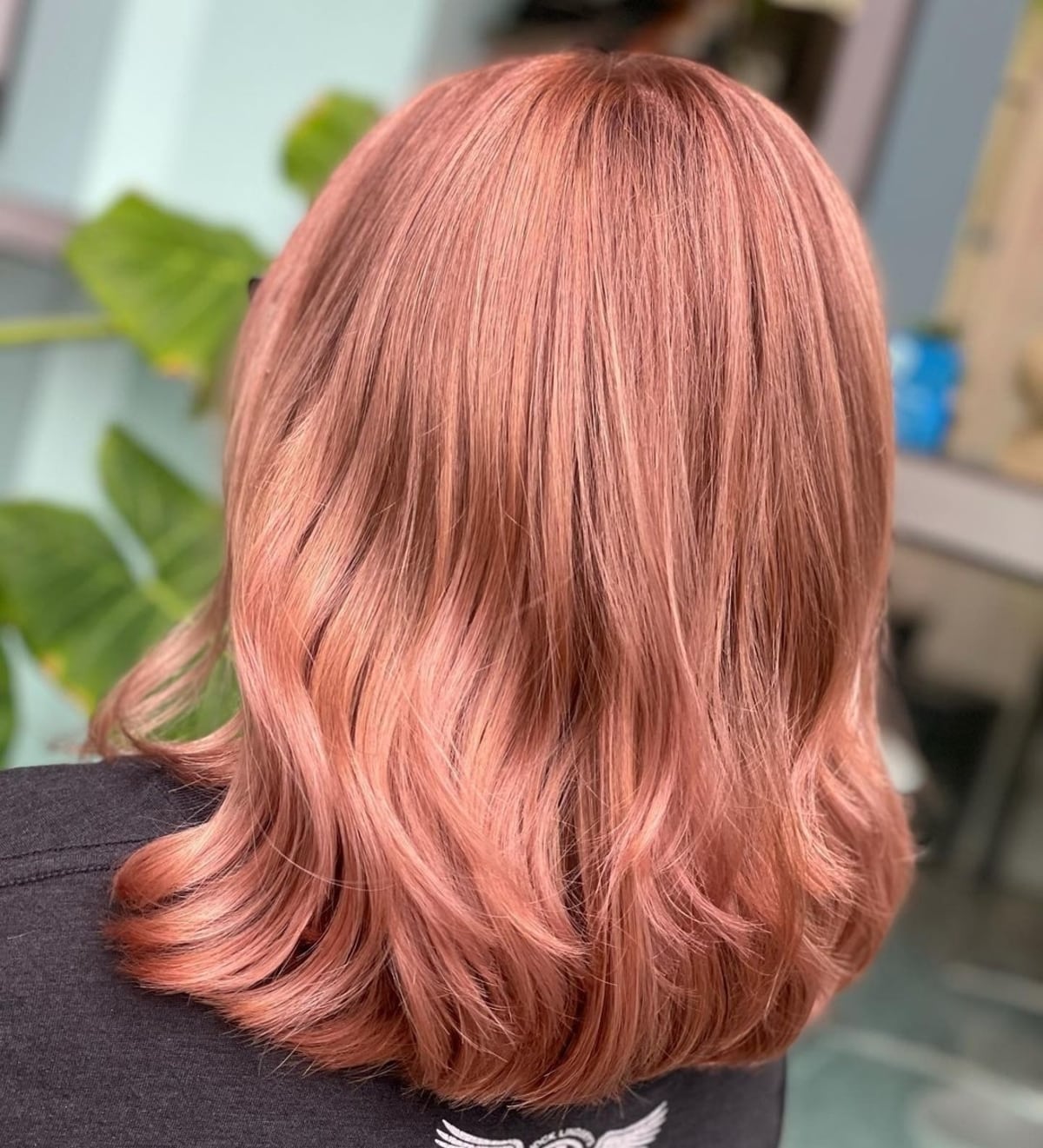 Mid-length blonde hair with rose gold undertones