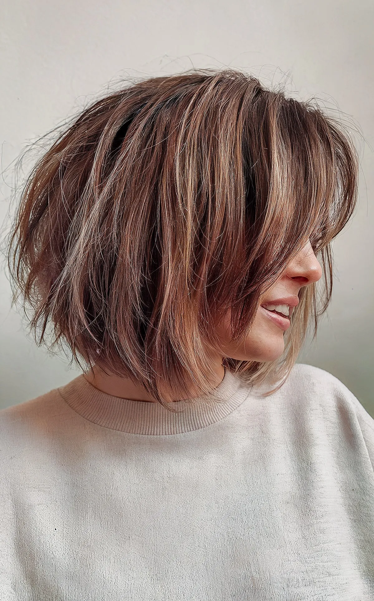 Layered bob with long bangs hairstyle
