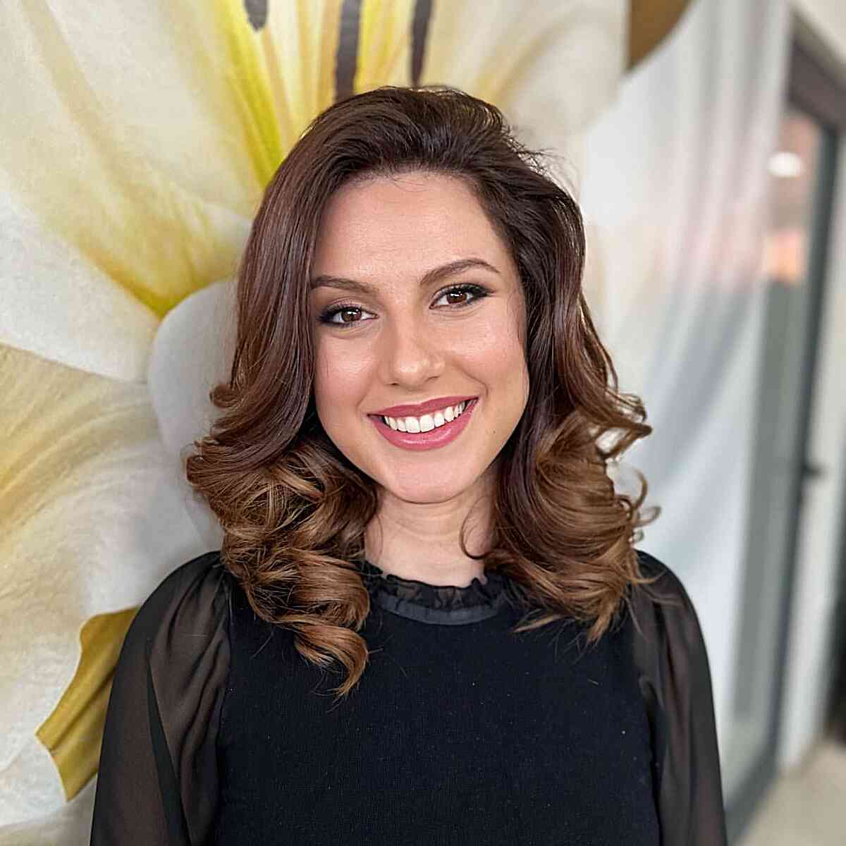 Mid-Length Curled Chocolate Hair for an Oval Face