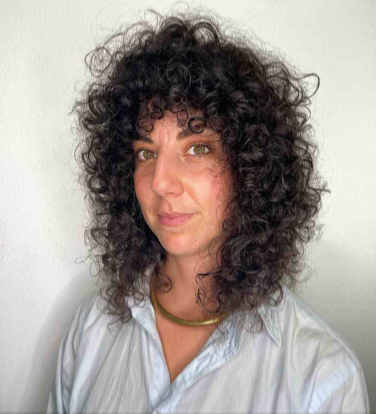 Mid-Length Curly Shag for a Lady in Her 40s