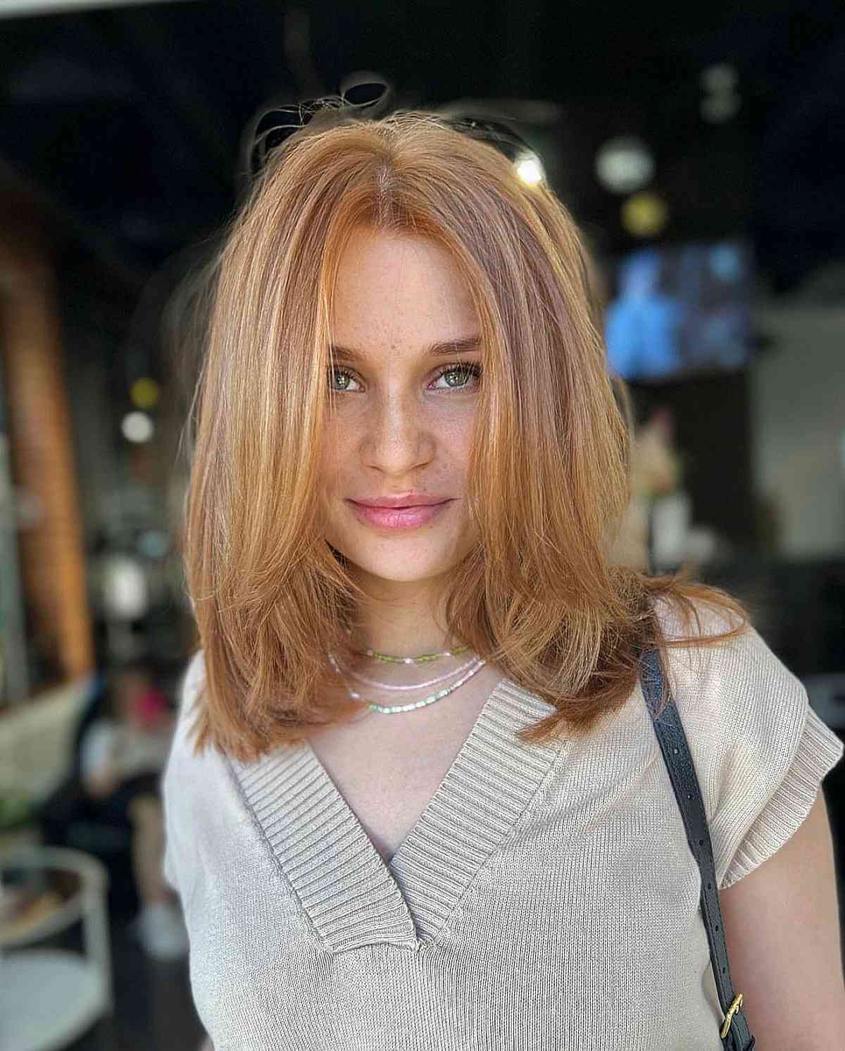 Mid-Length Layered Ginger Hairstyle