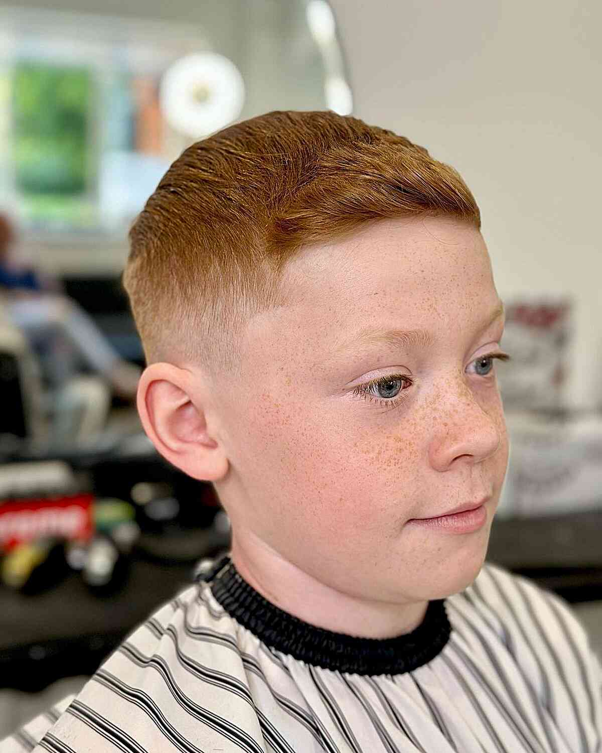 Mini quiff with a close fade for younger boys with short thick hair