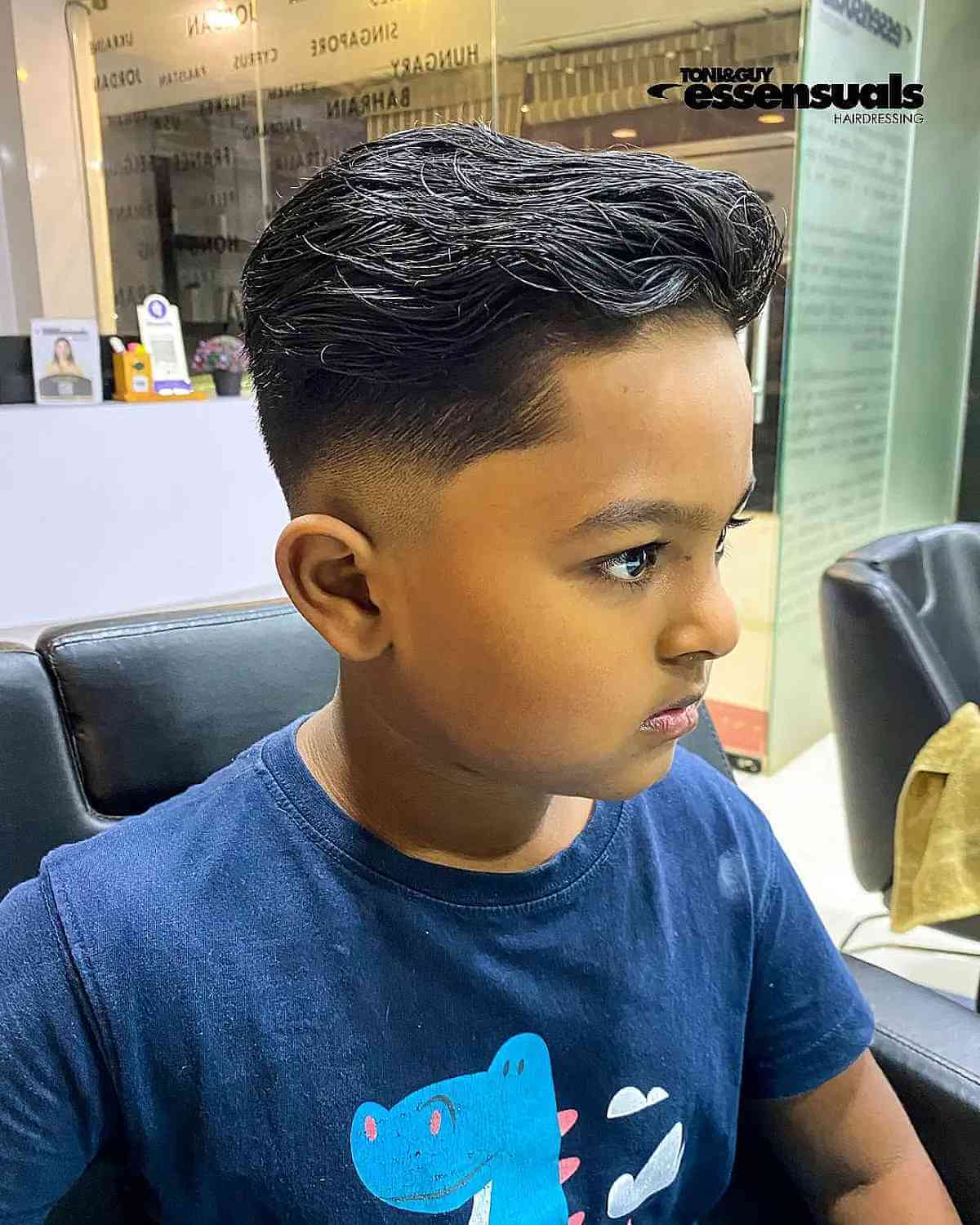 Modern Mid Fade with a Longer Wavy Top for Boys