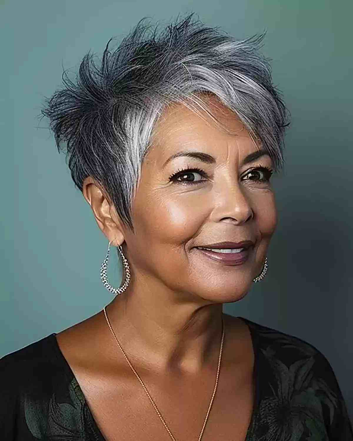 Modern Spiky Pixie Cut with Silver Balayage for a Woman Aged 60