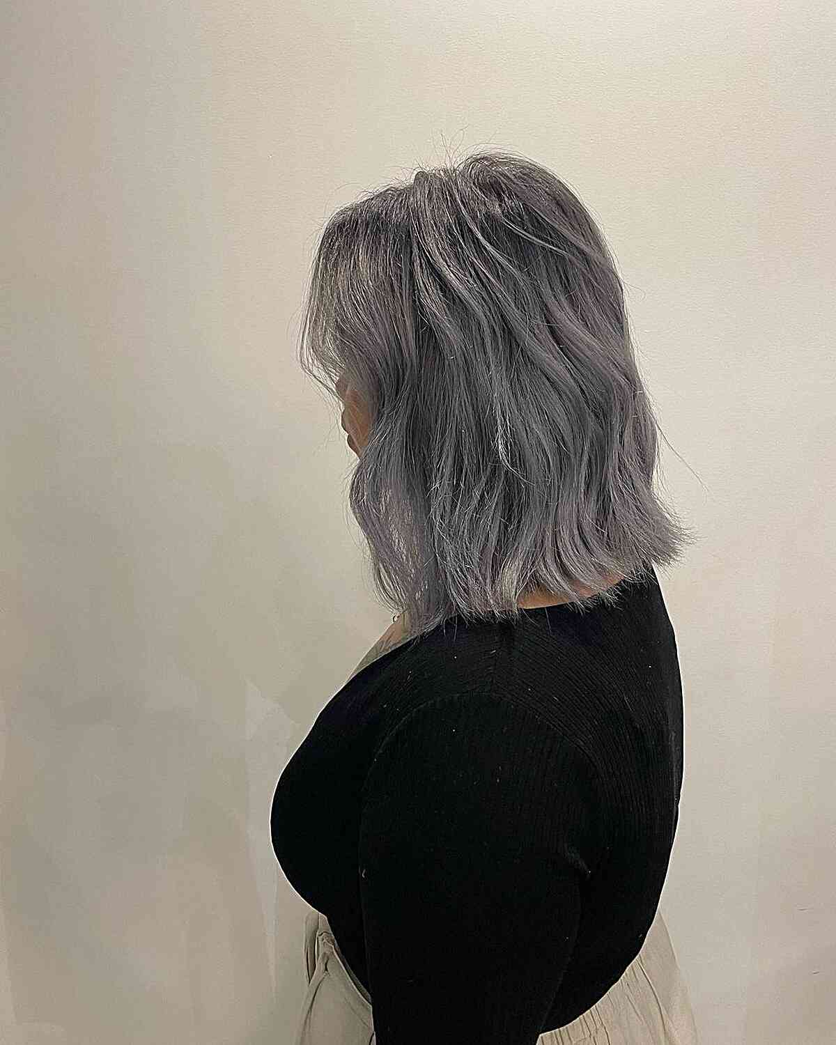 Ombre styled steel grey shoulder length hair