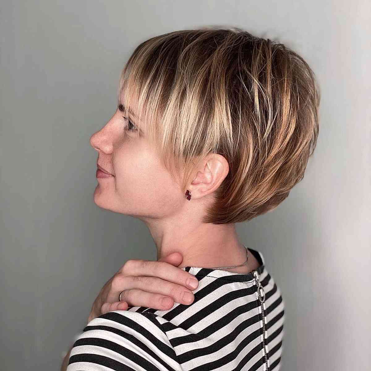 Pixie Bob with Accentuating Highlights for Fine Hair