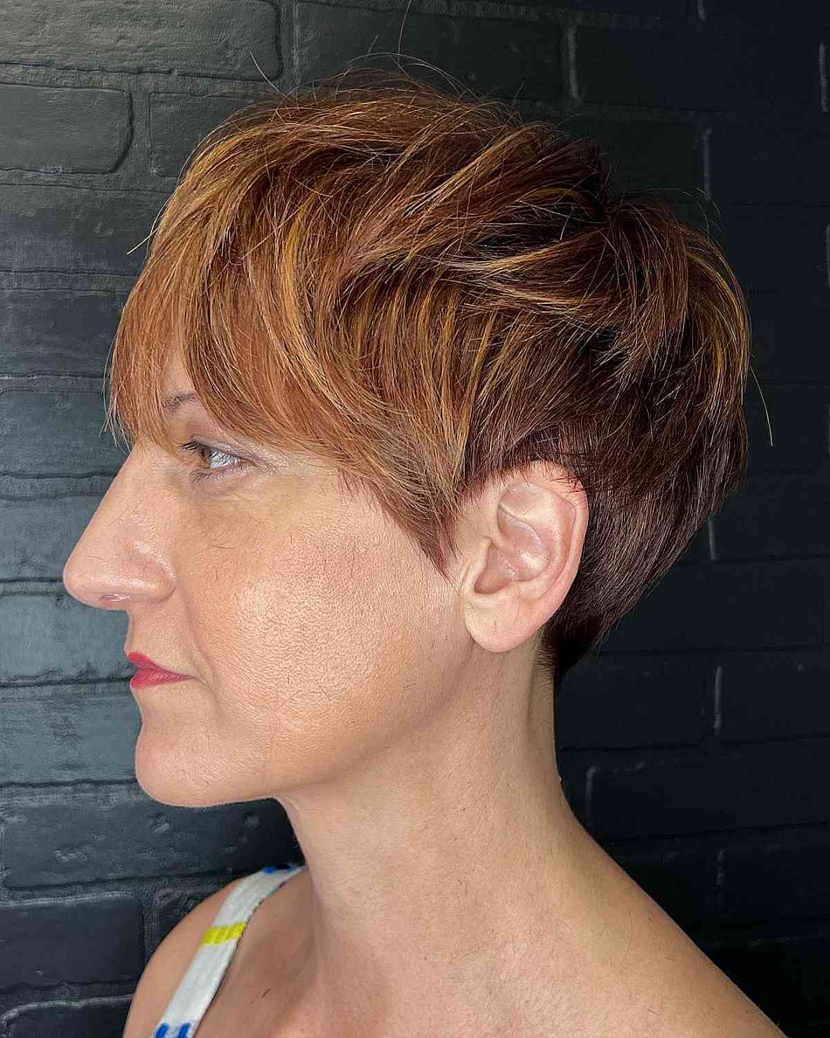 Pixie Cut with Radiant Copper Highlights