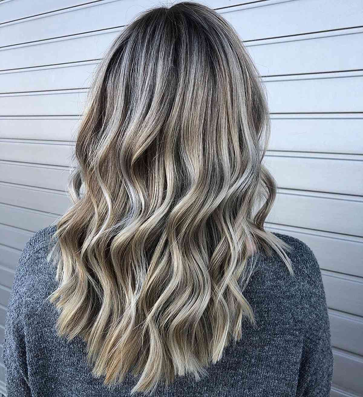 Platinum Highlights on Mushroom Blonde Tresses