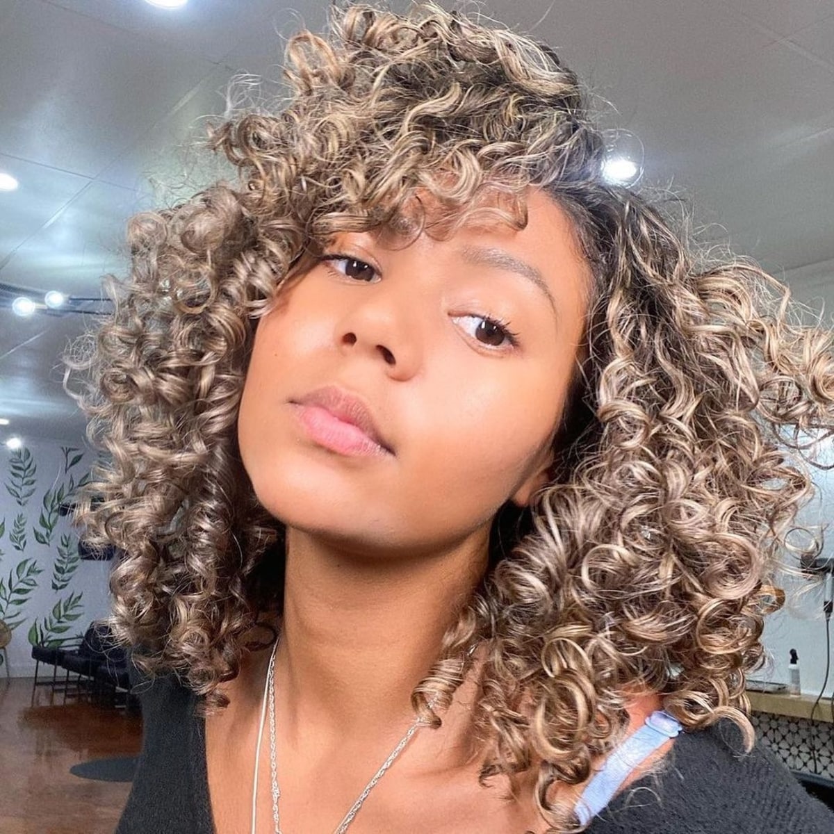 Playful Kinky Curly Side Bangs