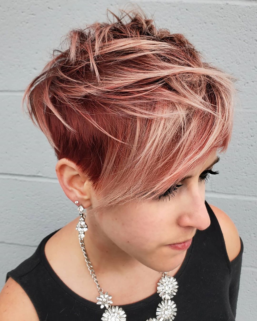 Playful Strawberry blonde pixie