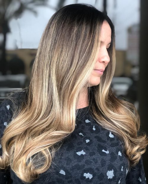 Medium-Length Radiant Golden Blonde Balayage for Fine Hair