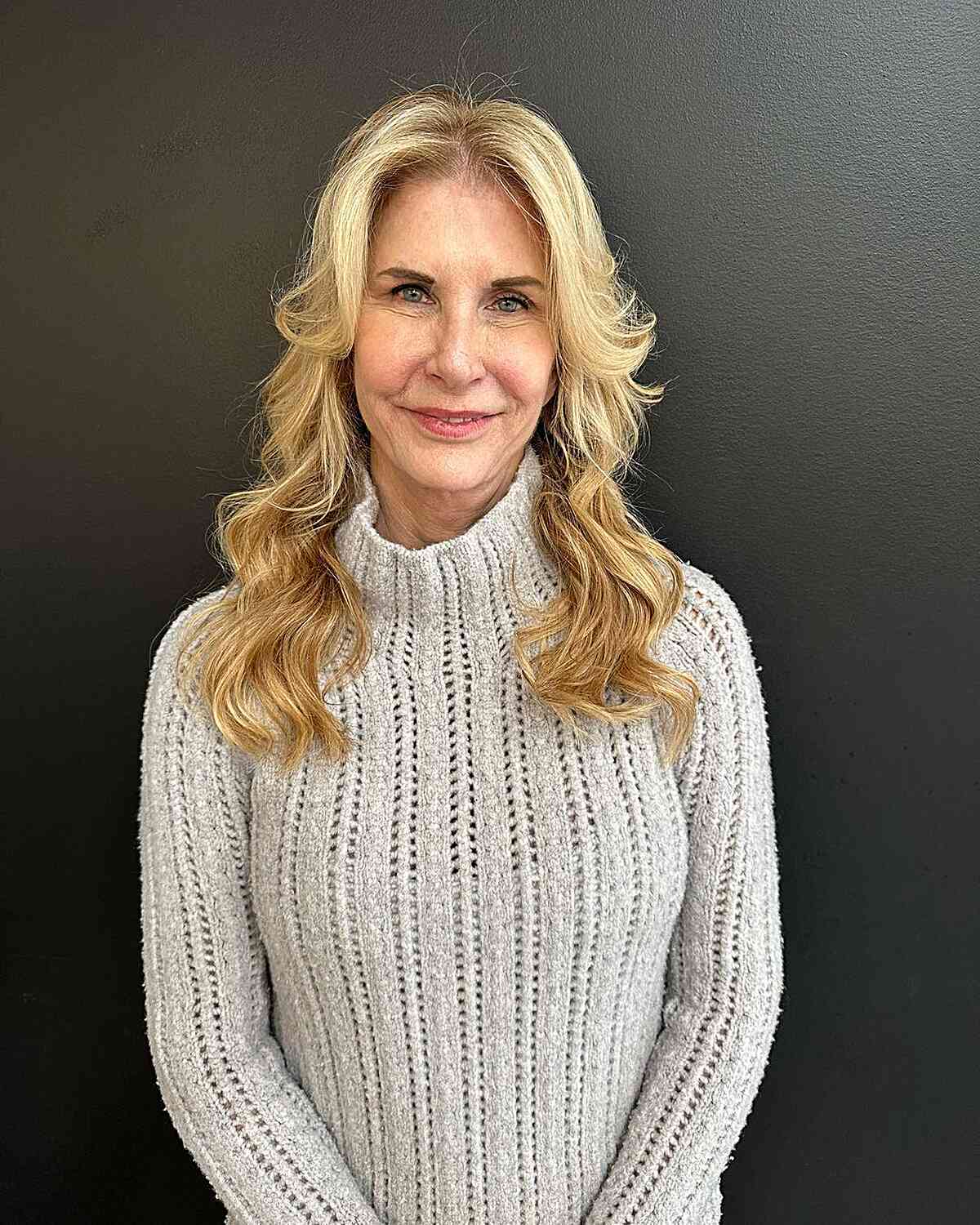 Radiant Golden Blonde Shag Featuring Curtain Bangs for Older Ladies with longer hair