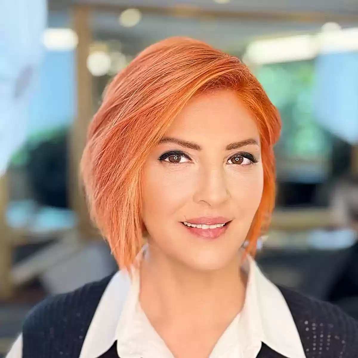 Radiant Orange Blunt Bob with a Side Part