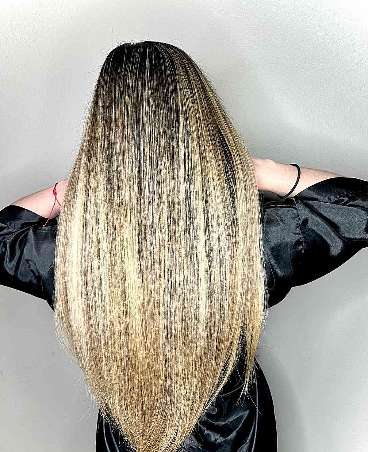 Radiant Sandy Blonde with Dark Roots for Straighter Locks