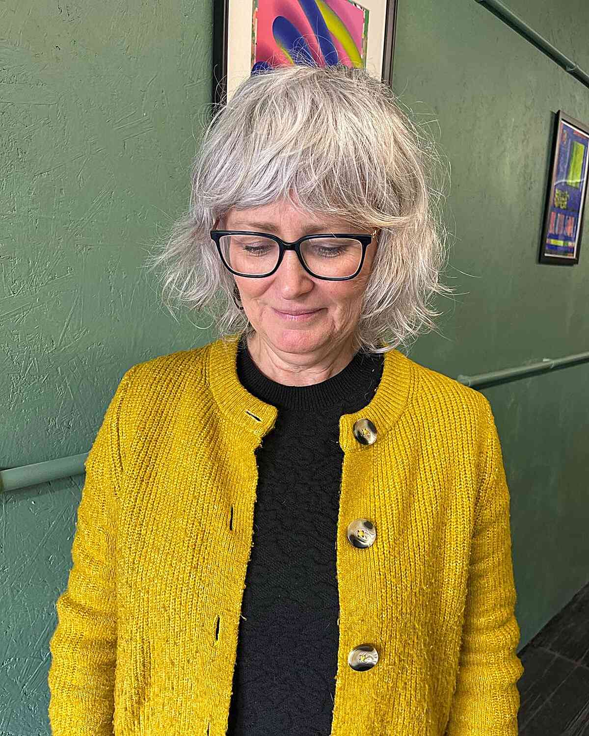 Razor Cut with Natural Color and Bangs for Fine Hair women with a low-maintenance style