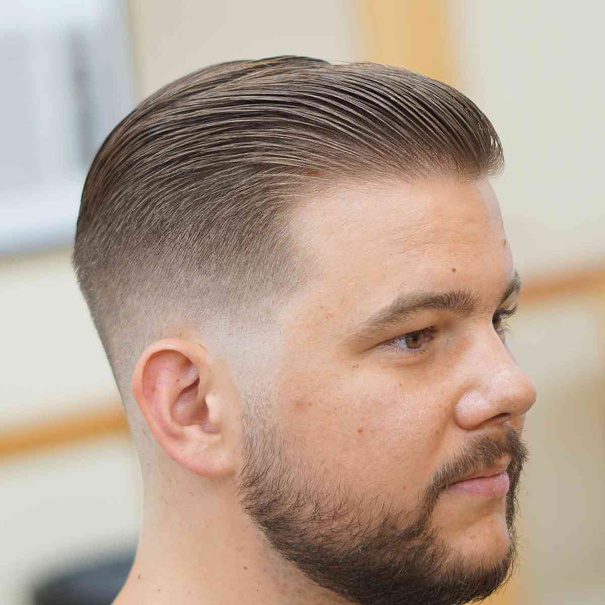 Refined Slicked Back Tapered Haircut