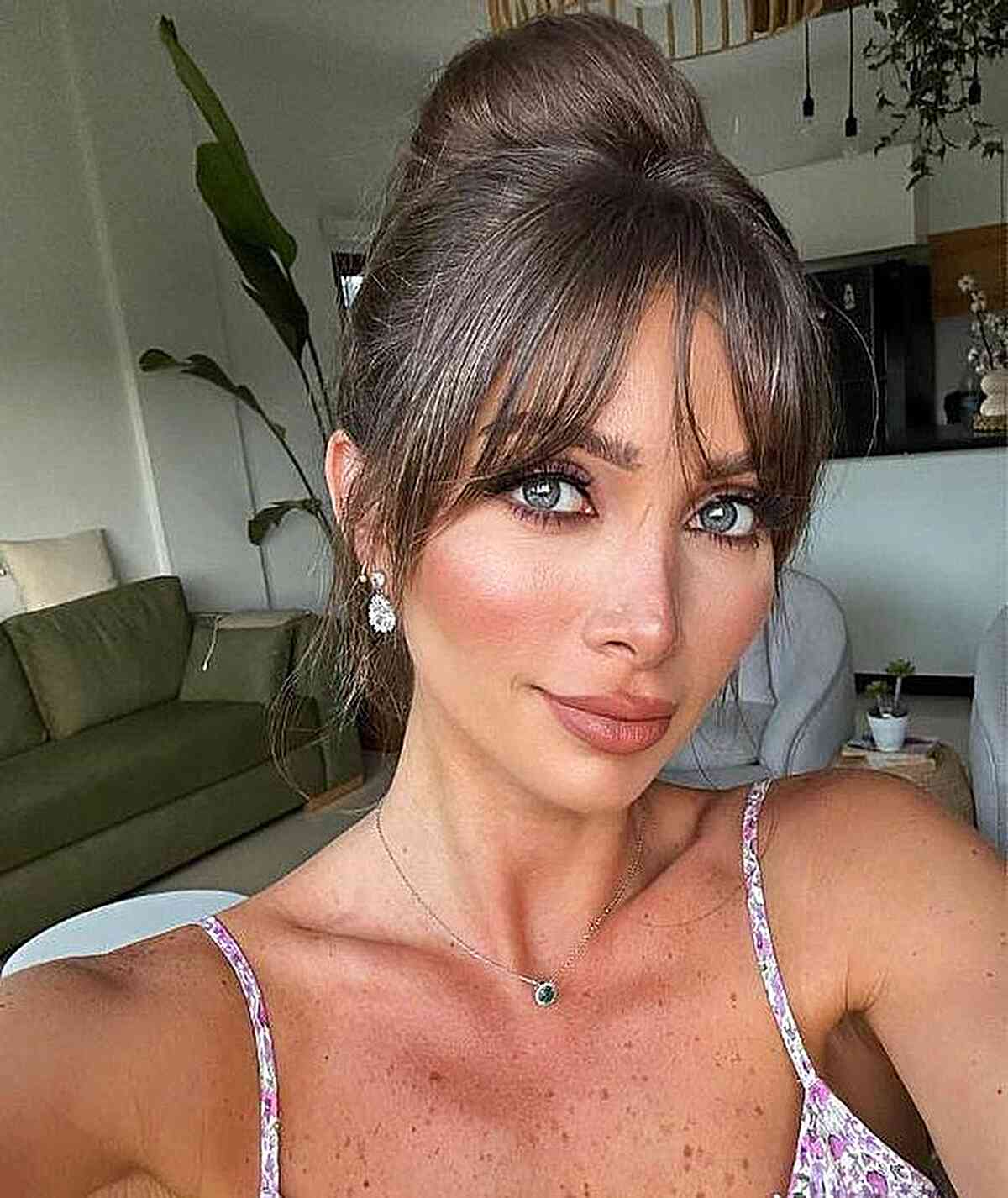 Relaxed Soft Updo Featuring Bangs