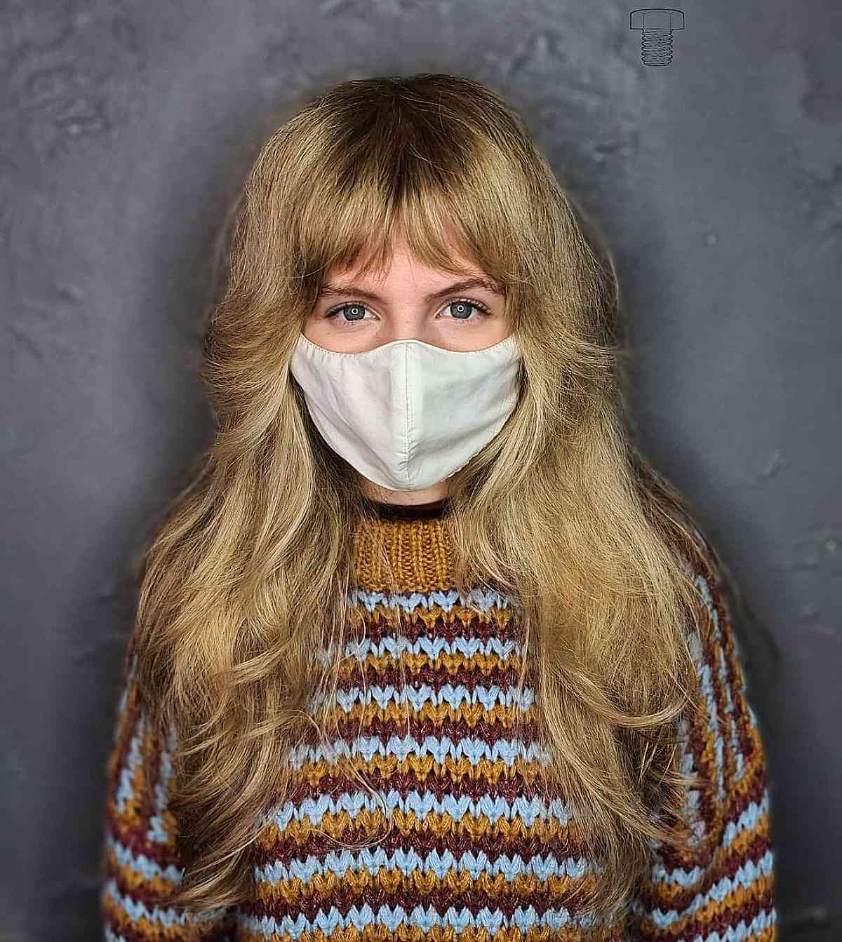 Retro 70s Shag Featuring Soft Layers and Bangs for Long Hair