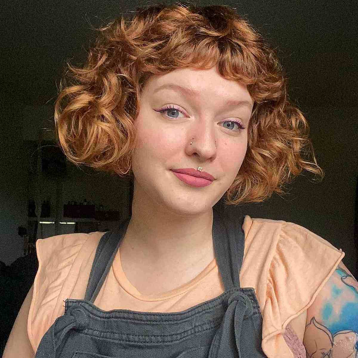Retro Chin-Length Curly Bob with Short Bangs