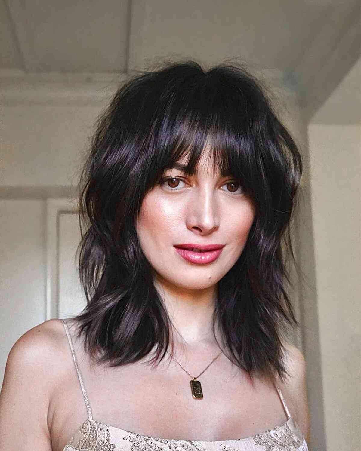 Rich Brown Collarbone-Length Shag with Bangs