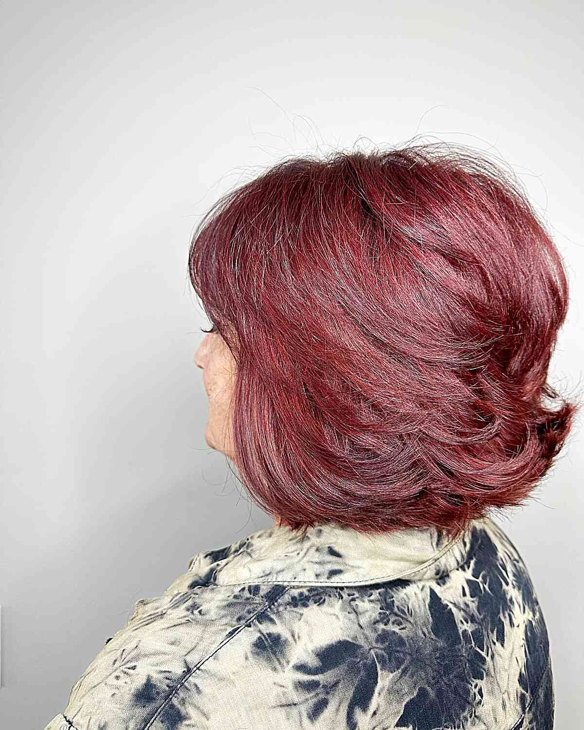 Short Rich Burgundy Red Hair with Gentle Butterfly Layers