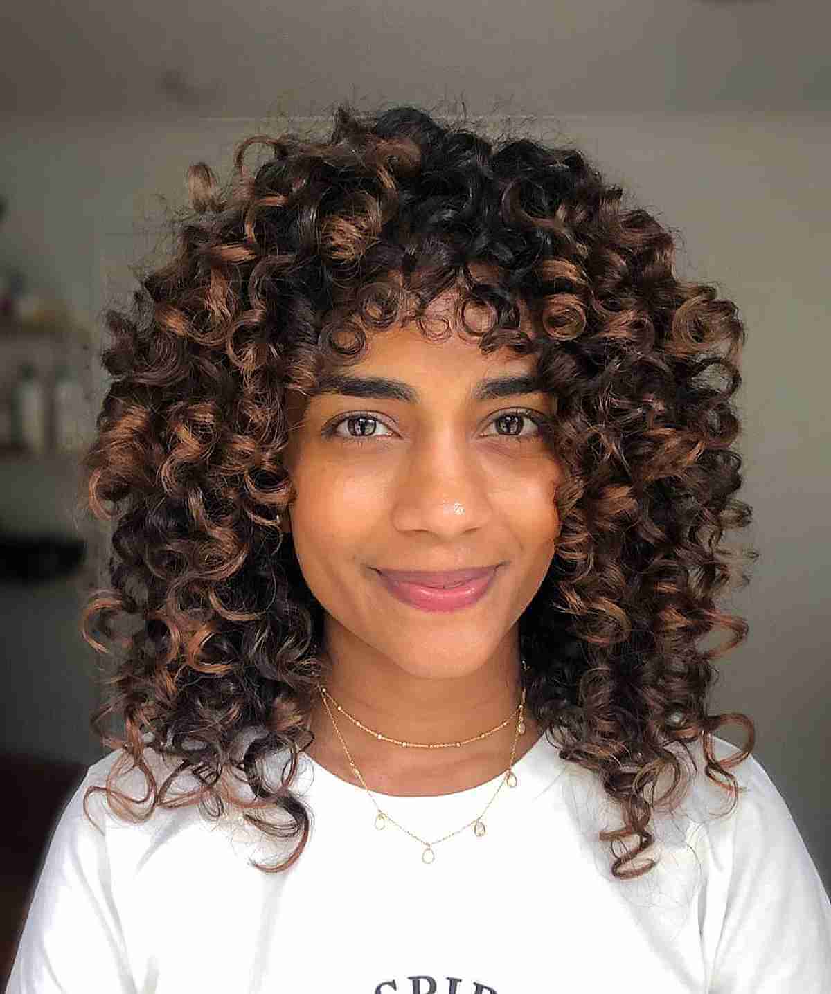 Rich Caramel Balayage on Curly Brunette Hair