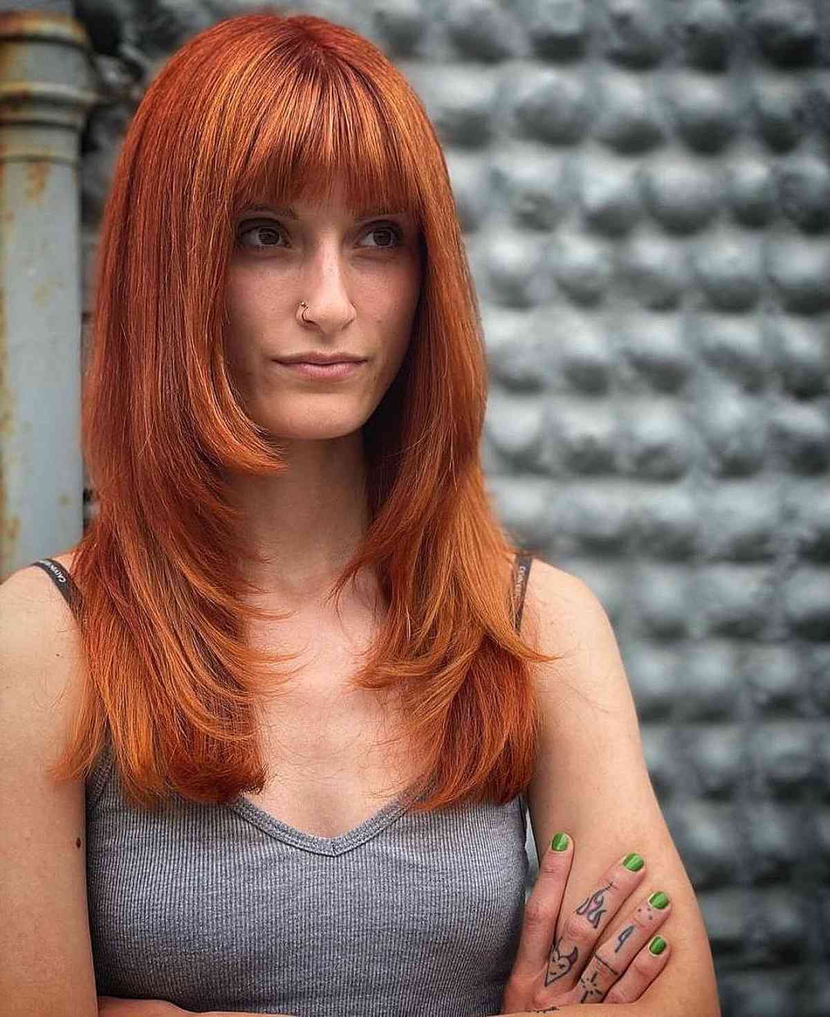 Rich Copper 90s-Inspired Layers with Bangs