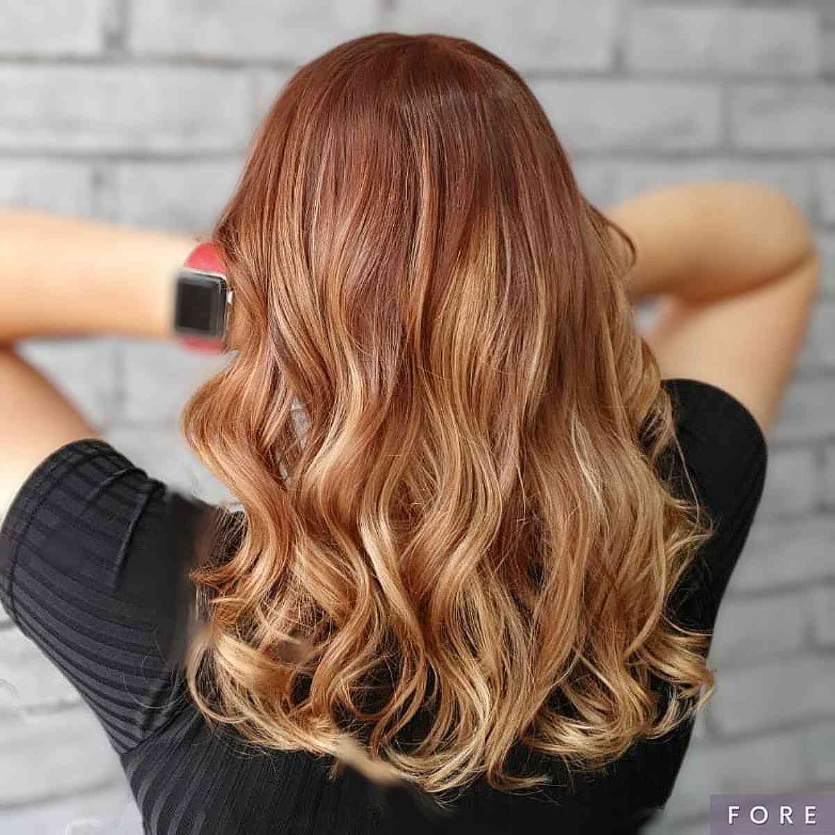 Rich Strawberry Blonde with Gentle Balayage Highlights
