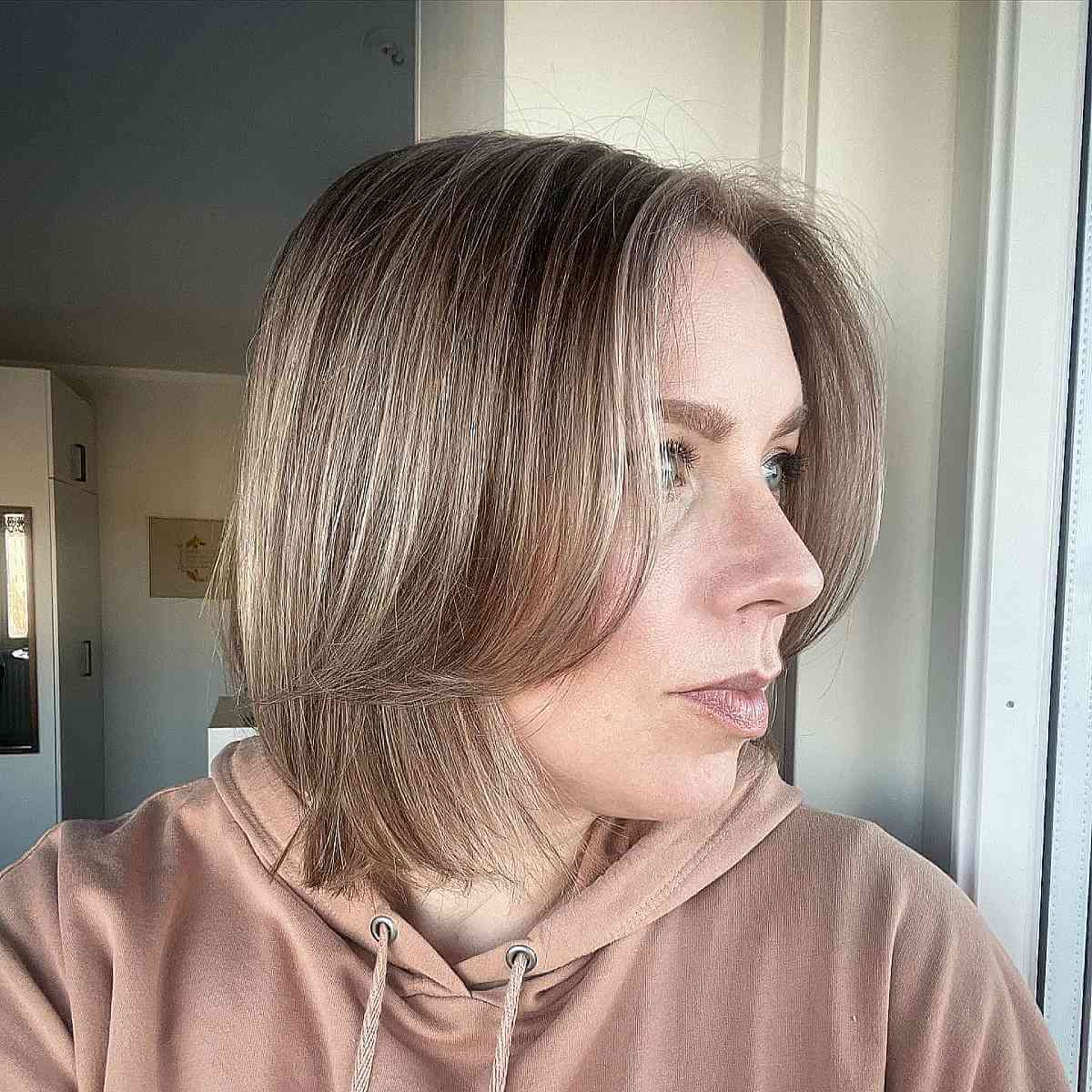Sandy Ash Dishwater Blonde with Deep Roots