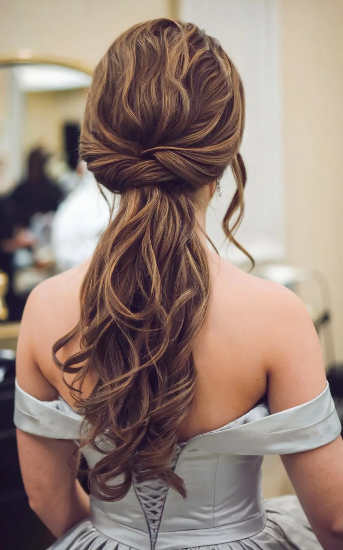 Long Voluminous Ponytail with Waves