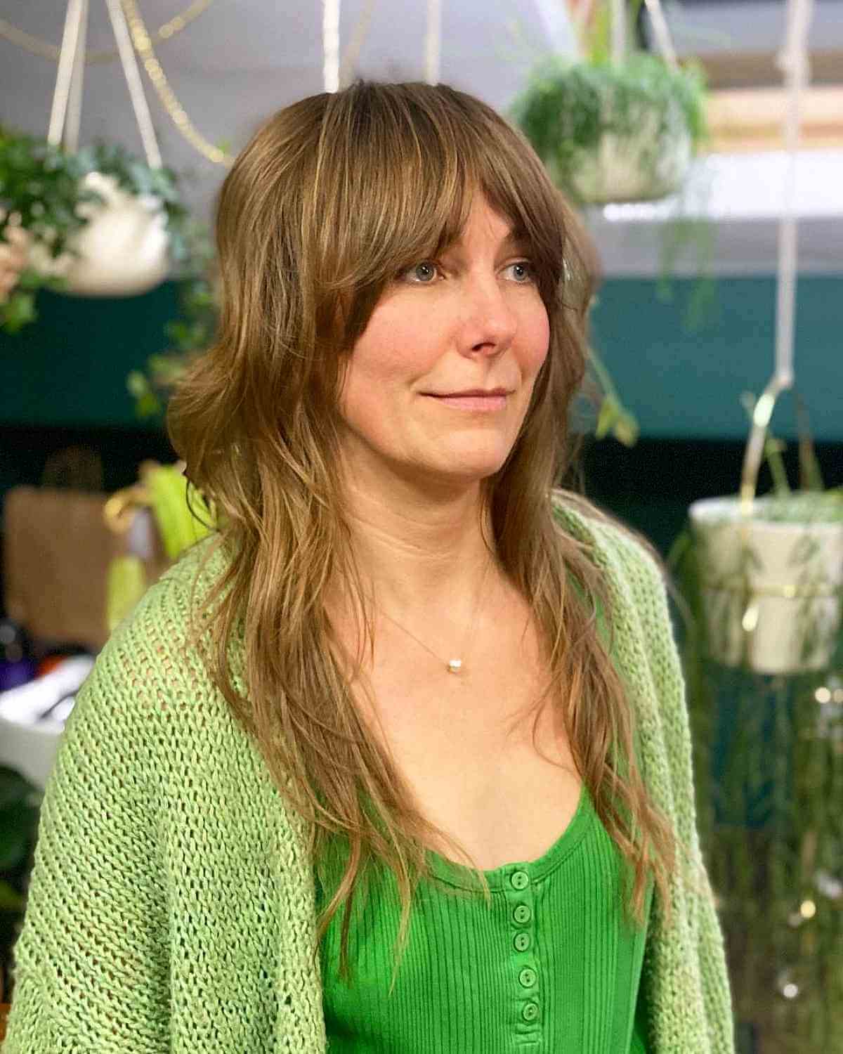 Long Shag Haircut with Curtain Bangs for Women Aged 40 and Above