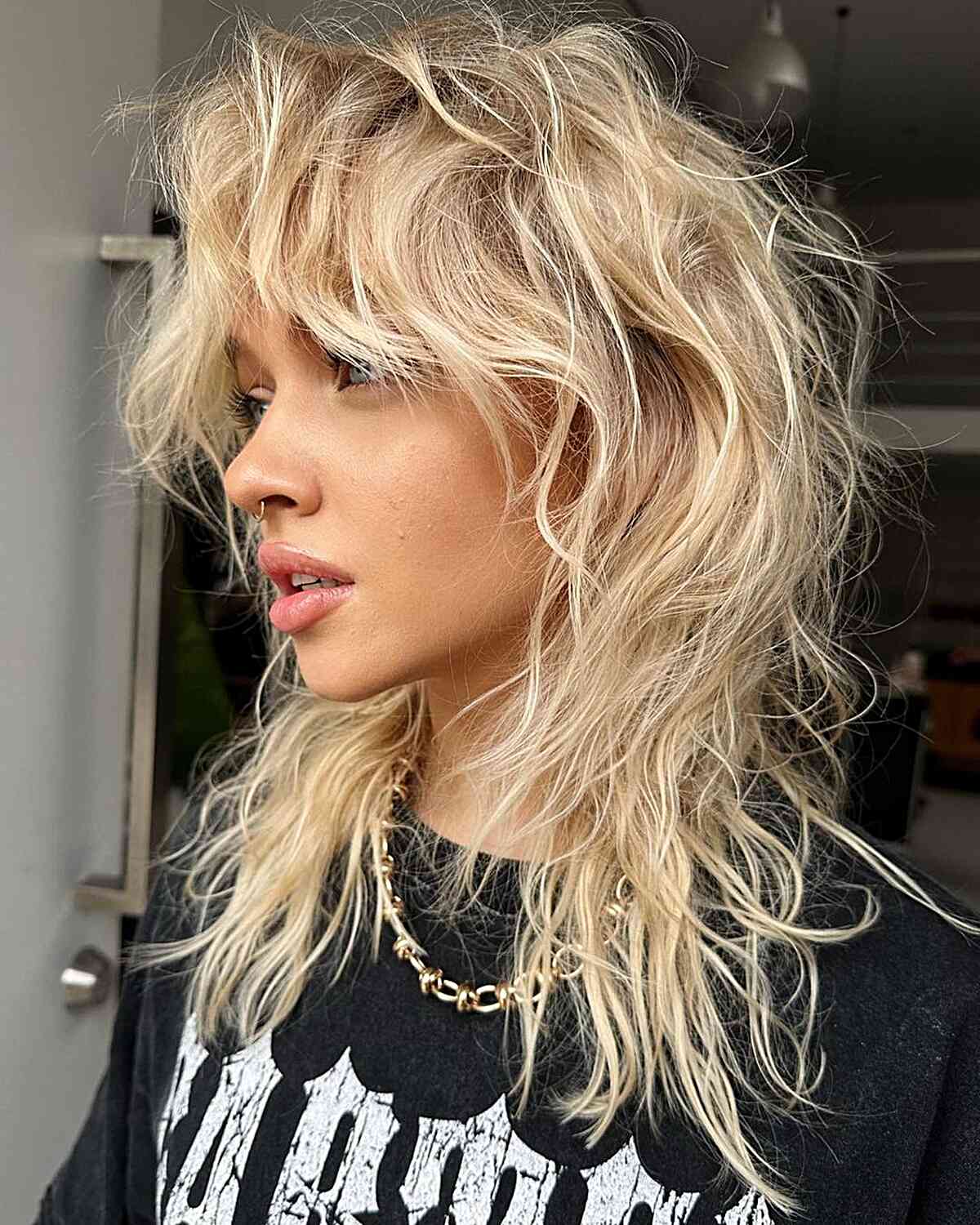 Shag with Intense Texture and Curtain Bangs for edgy girls