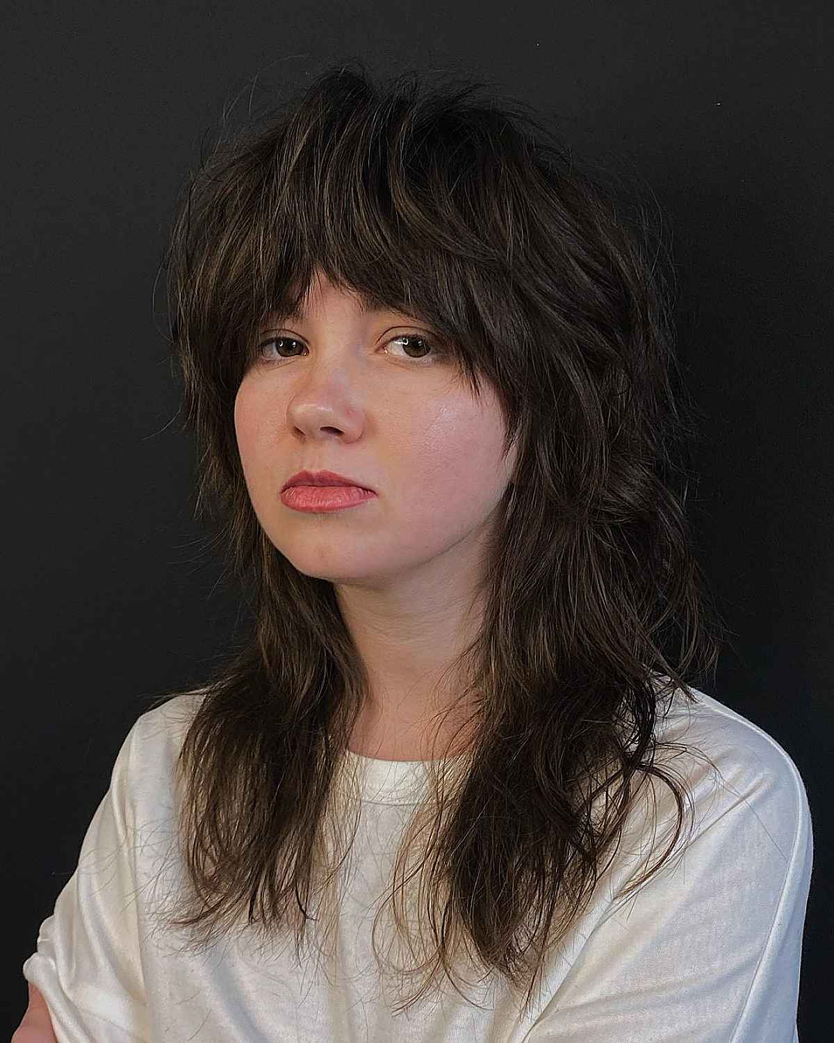 Shaggy Layered Wolf Cut with Bangs