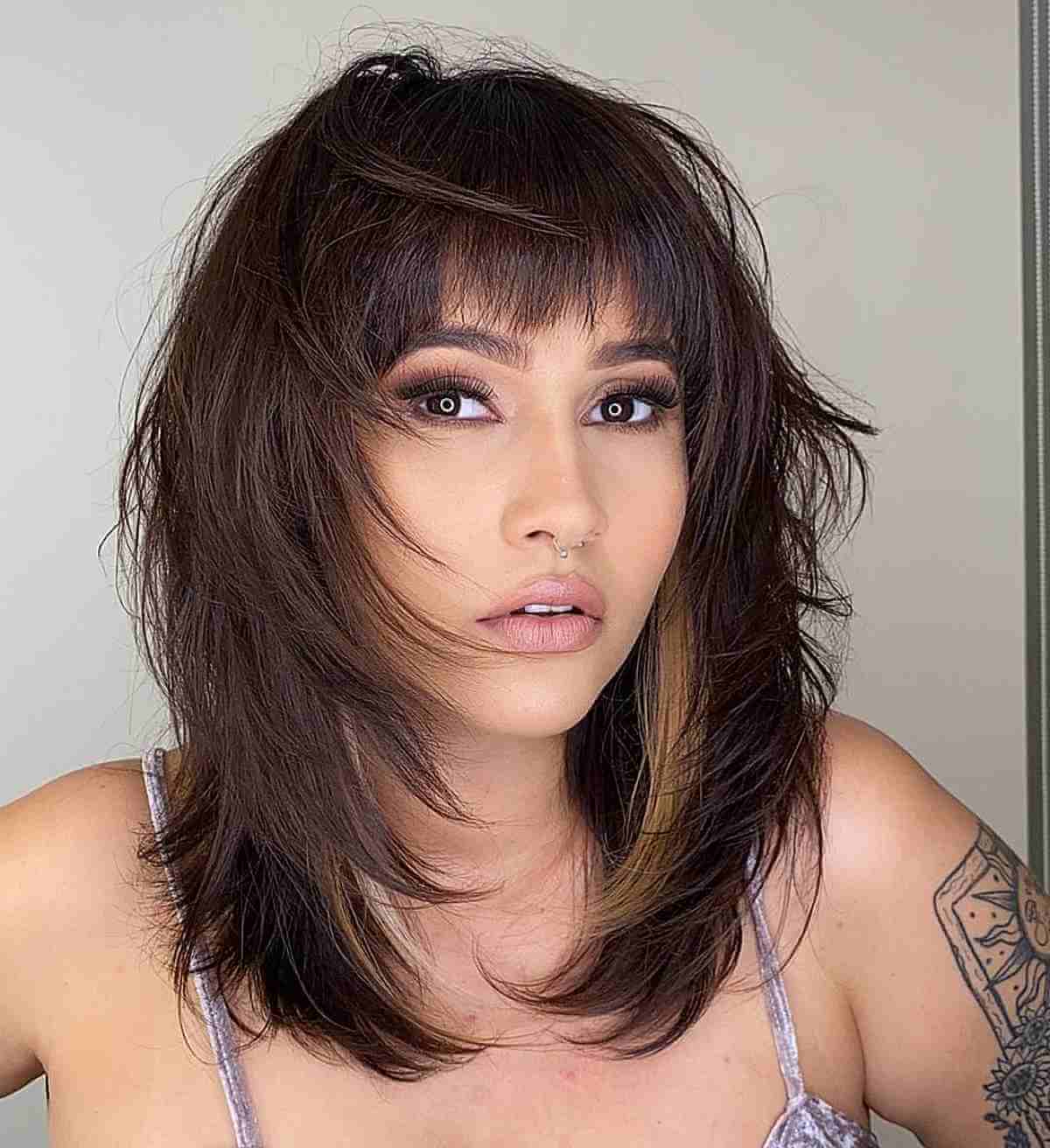 Choppy Layers and Bangs on Medium Shaggy Straight Hair