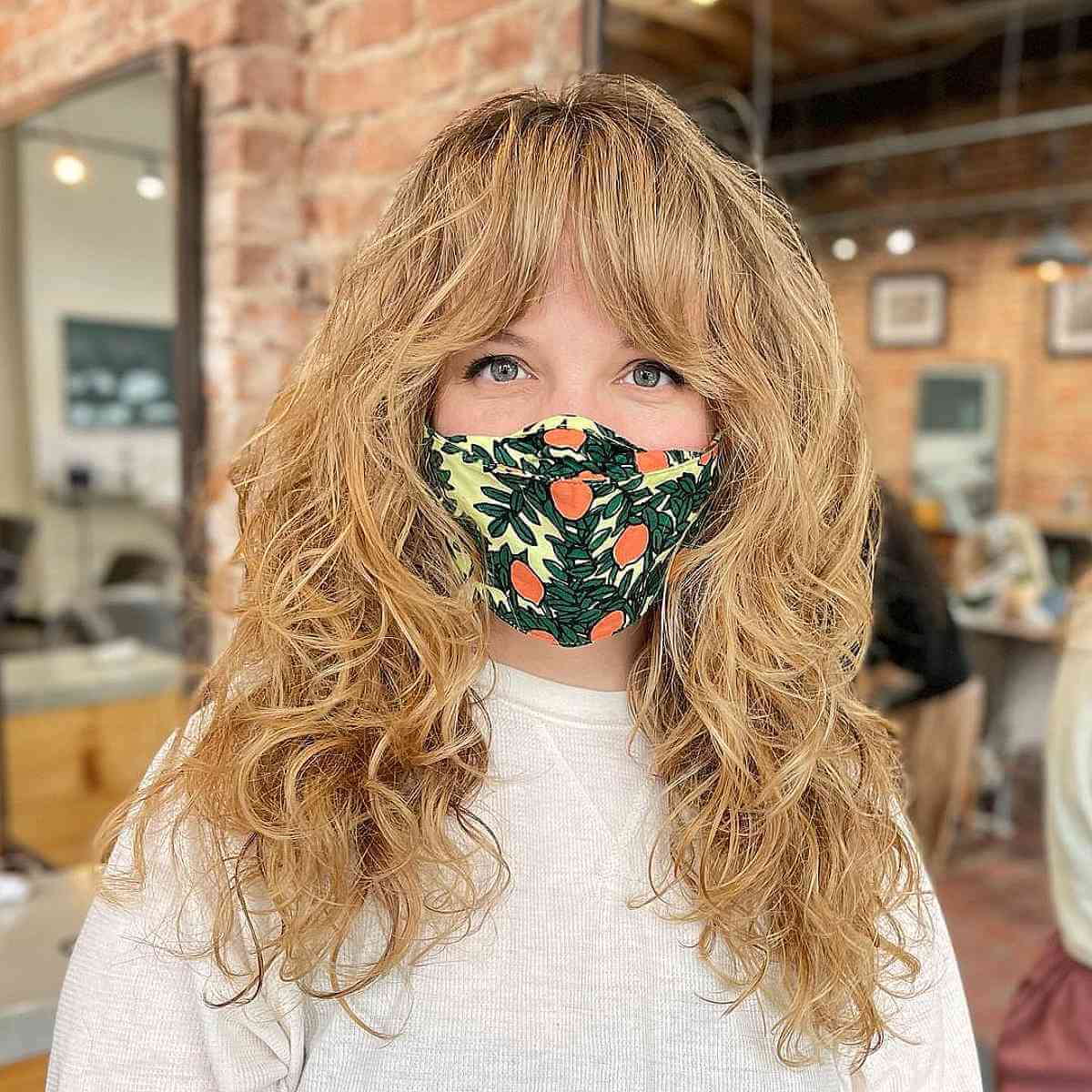 Shaggy Curly Tousled Layers Featuring Curtain Bangs