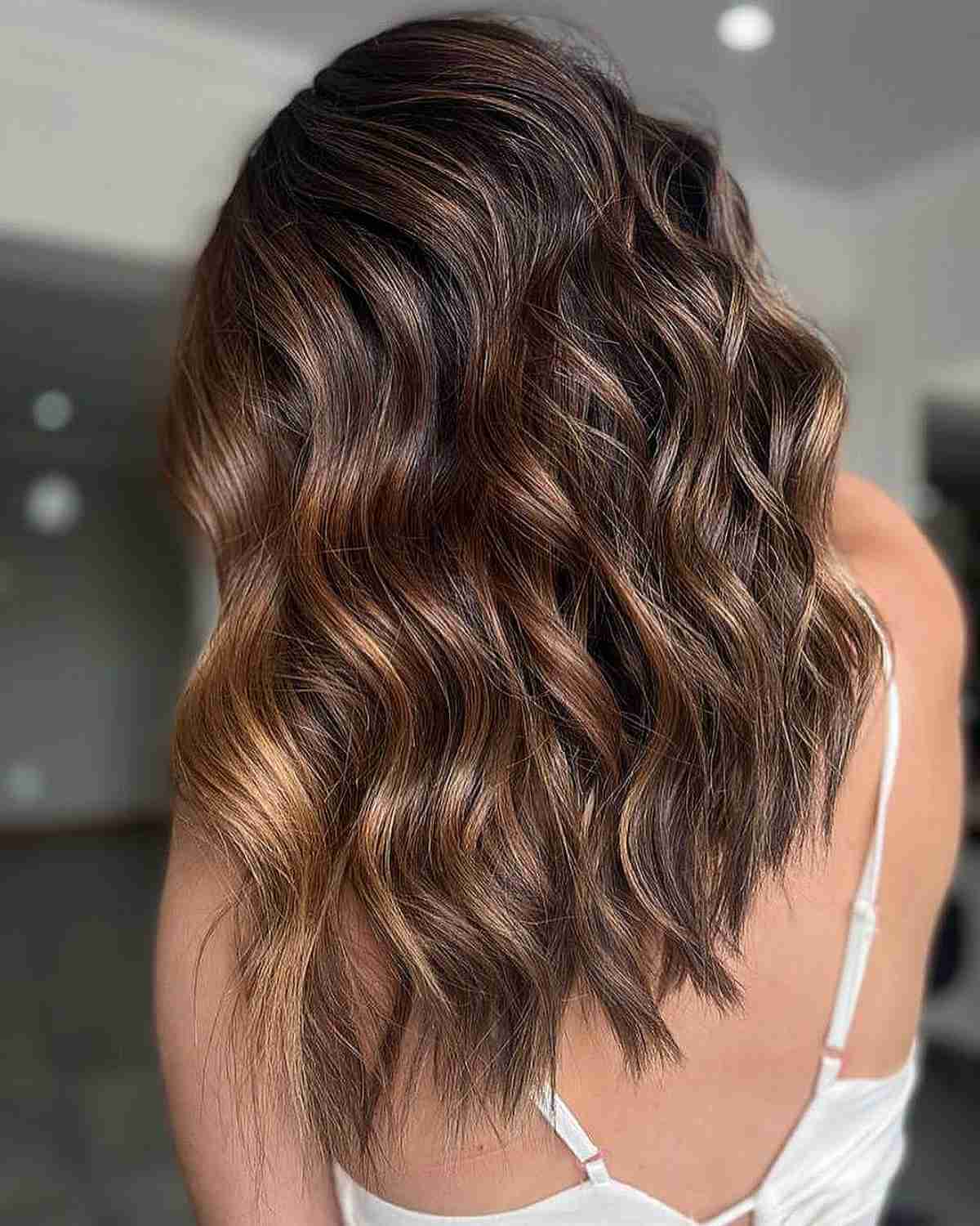 Shiny Caramel Balayage on Brown Hair with a Money Piece