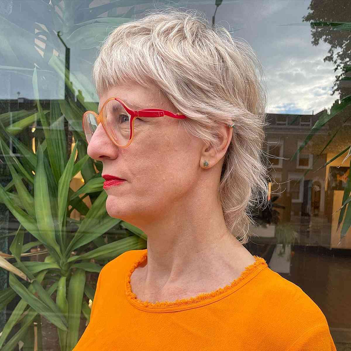 Short Bangs with Baby Mullet for Older Women