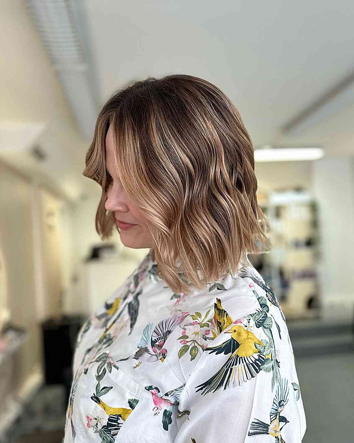 Short Brunette Hairstyle with Subtle Light Brown Highlights