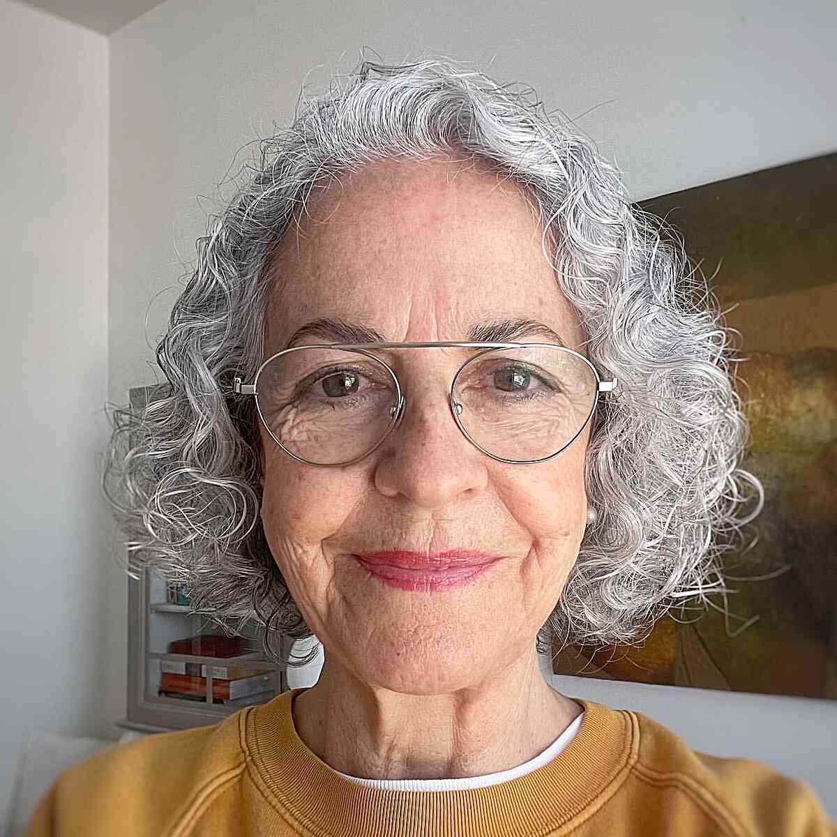 Chin-Length Icy Blonde Short Curly Hairstyle for Women Over 60