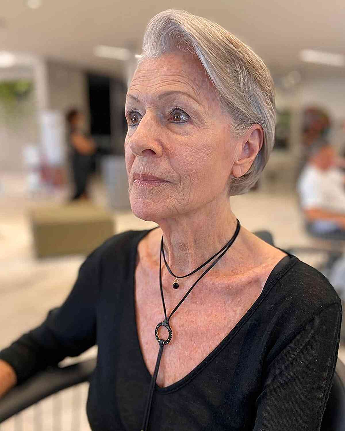 Short Hair with Volume and a Side Part for 60-Year-Olds with Grey Hair and an oval face