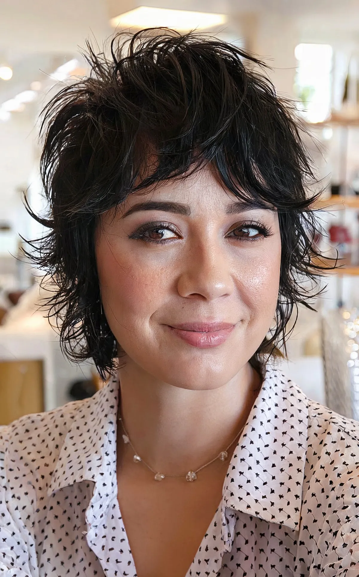 Chin-Length Baby Shullet with Short Layers and Wavy Bangs