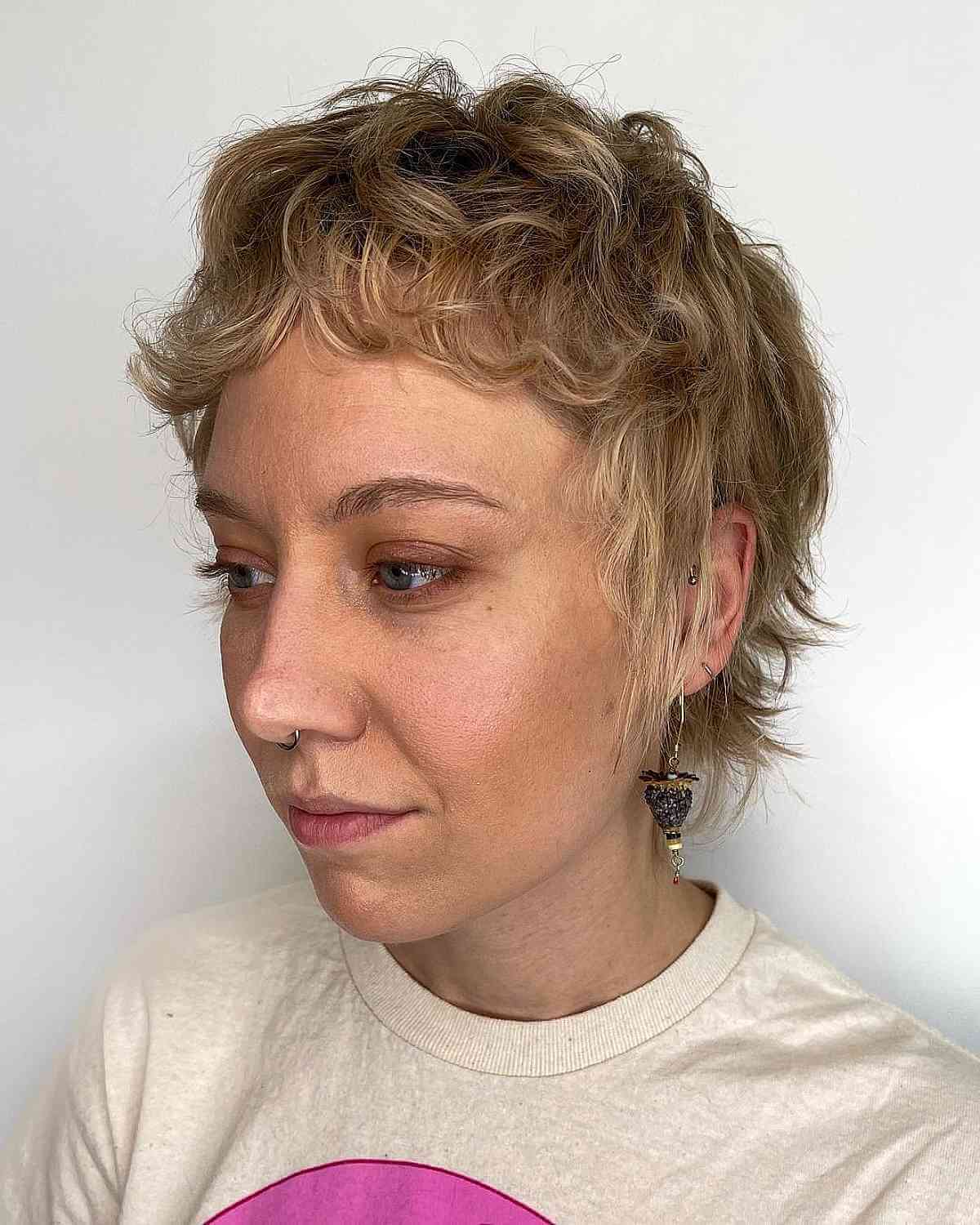 Pixie Mullet with Baby Bangs for Wavy Locks