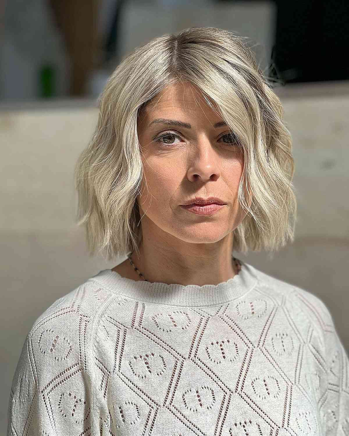 Shoulder-Length Cut with Soft Waves for Square Faces